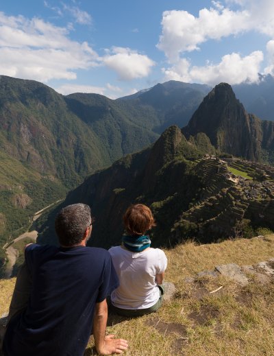 Couple looking at Machu Picchu, Peru, from above