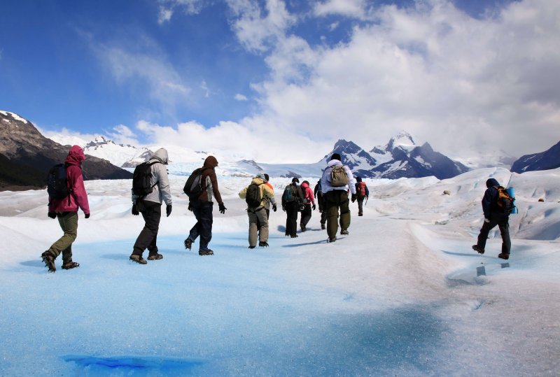 people hiking in patagonia landscape
