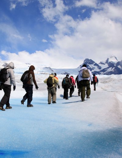 group hiking in patagonia landscape