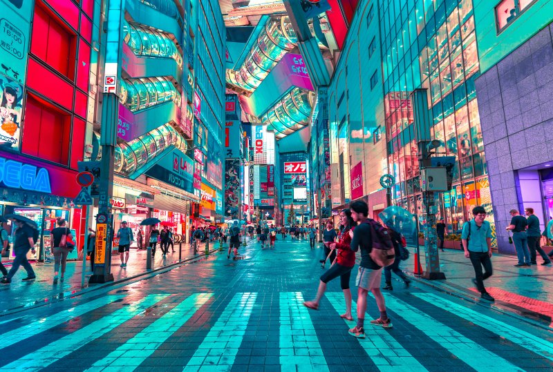 Crowded Tokyo street with shoppers and modern architecture